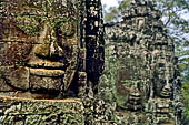 Angkor Thom - Bayon temple, second enclosure, corner towers seen from the central terrace